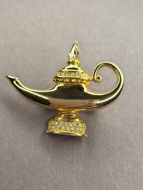 Gold-tone Aladdin Lamp Brooch with Clear Crystals